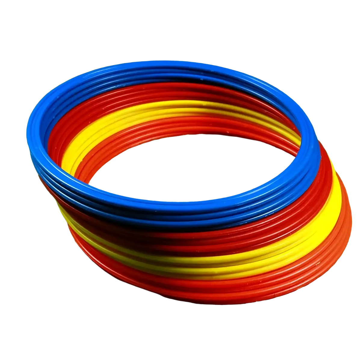 Stack of colorful plastic agility training rings in blue red and yellow for soccer speed exercise equipment