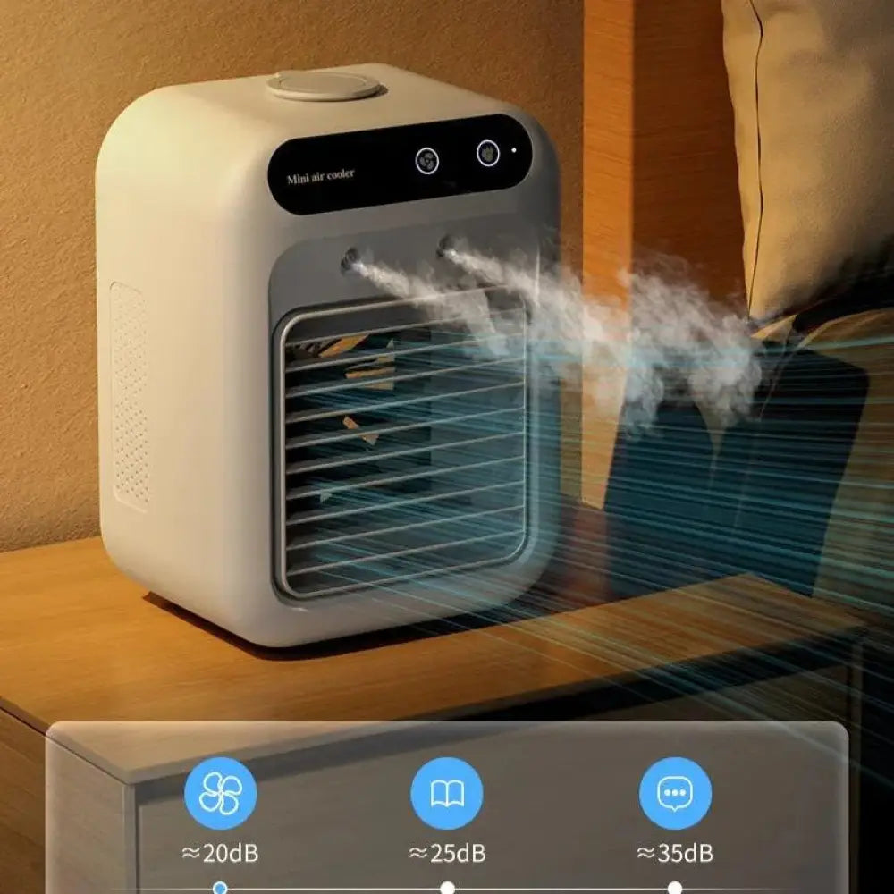 White portable mini evaporative air cooler and humidifier with sleek compact design and digital control panel emitting mist