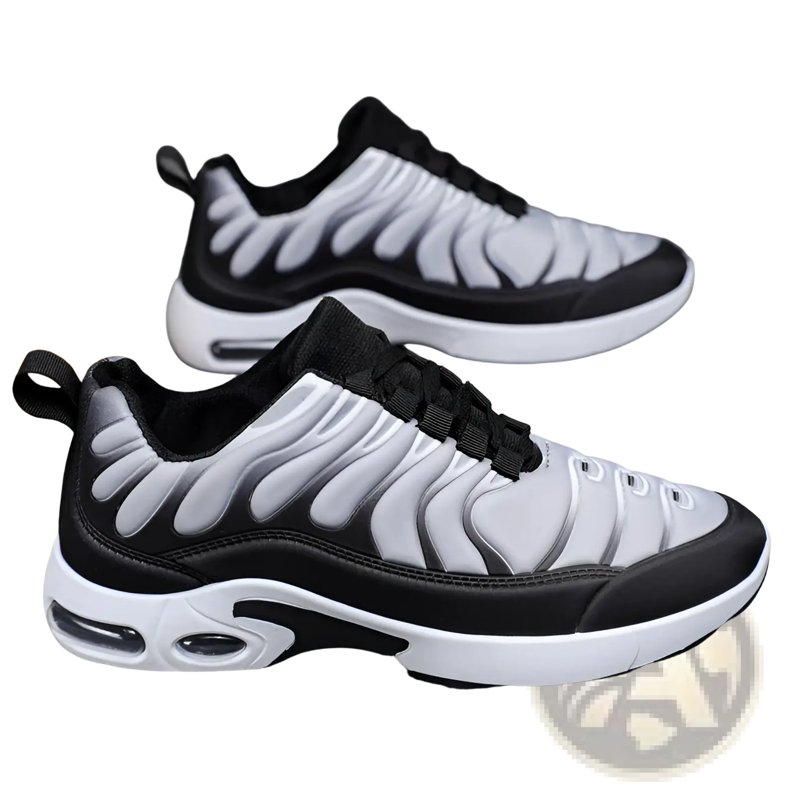 Black and silver air cushion running shoes with wave-like flame pattern upper and visible sole cushioning for athletic use