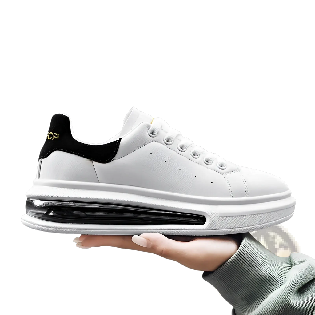 Air cushion sports sneaker in white pu leather with black accents and transparent air cushion sole for athletic use