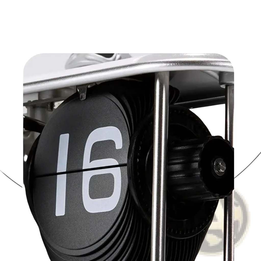 Black circular flip airplane desk clock with white numerals mounted on a metallic frame vintage table decor