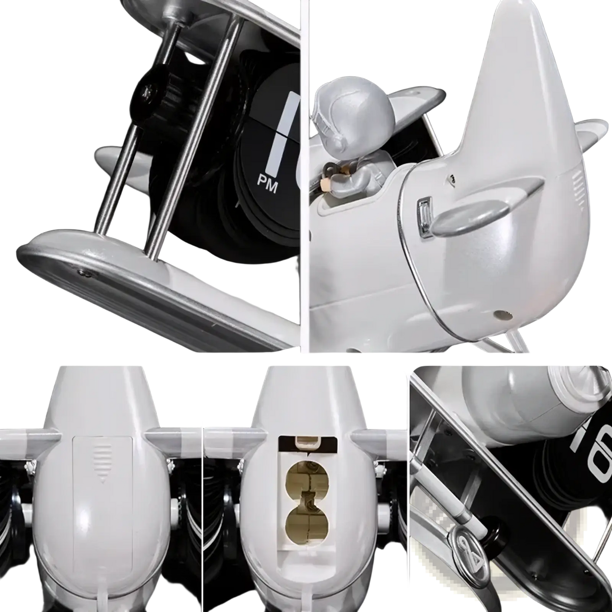White plastic airplane model with silver metallic accents and pilot figure inside used as a vintage flip desk clock decor