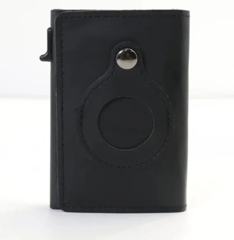 Black leather rfid slim airtag wallet with circular magnetic ring holder and silver-toned snap button closure