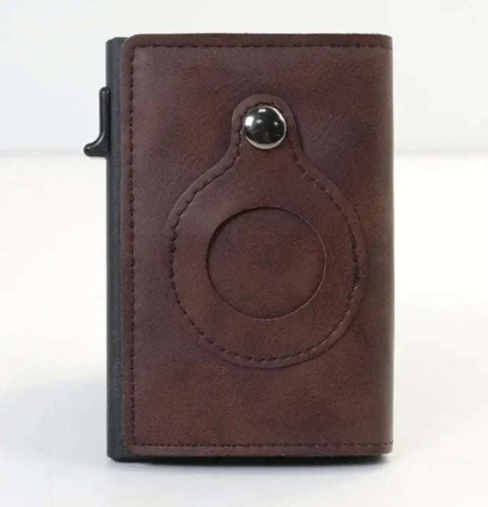 Brown leather rfid slim airtag wallet with circular cutout and silver-toned snap button for anti theft card holding