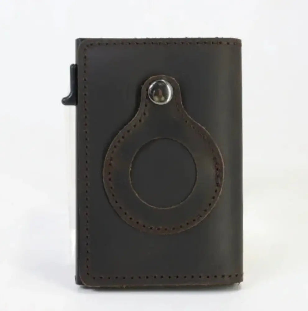 Dark brown leather rfid slim airtag wallet with circular leather loop and silver metal clasp for anti theft card holding