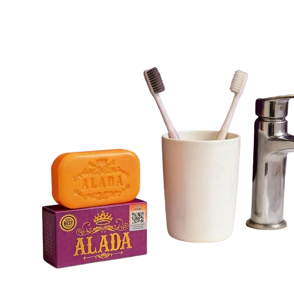 Orange alada brightening cleansing soap bar with embossed crown logo on purple box for skin feeling refreshed