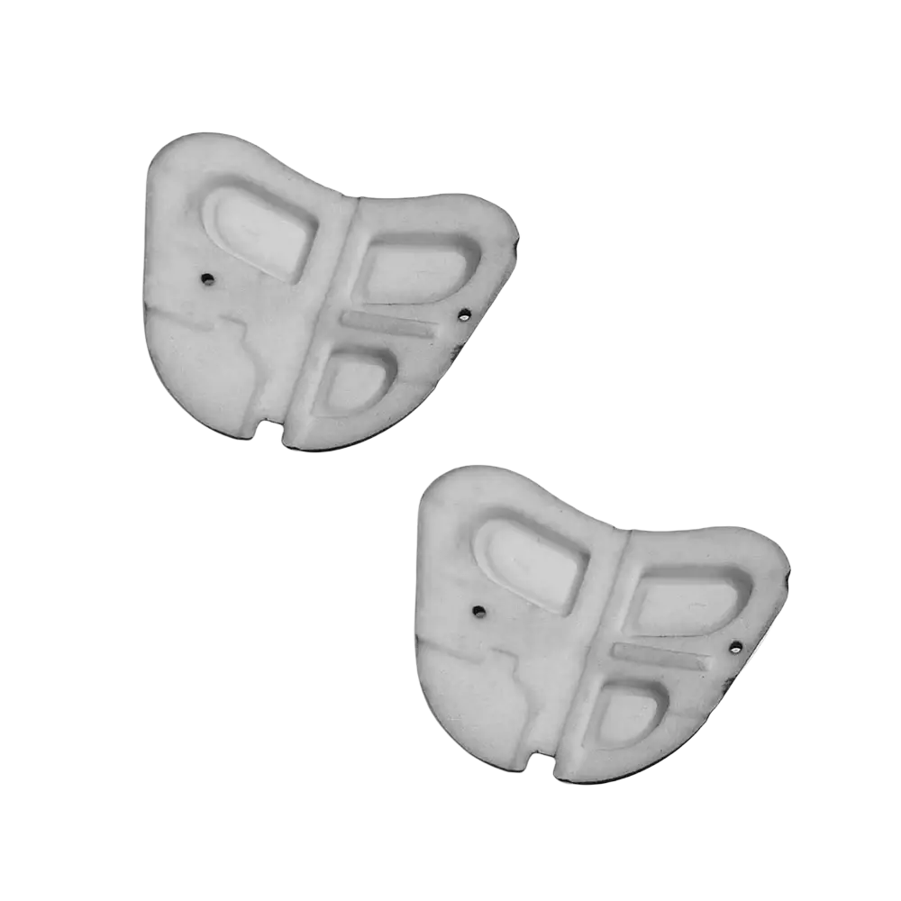 White plastic butterfly-shaped alfa 147 steering wheel audio control buttons with molded indentations and metal fasteners back view
