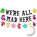 Alice in wonderland birthday banner with glittery were all mad here text and colorful character cutouts for party decor