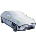 Silver quilted all-season waterproof car windshield sunshade cover with green trim and black edge detailing