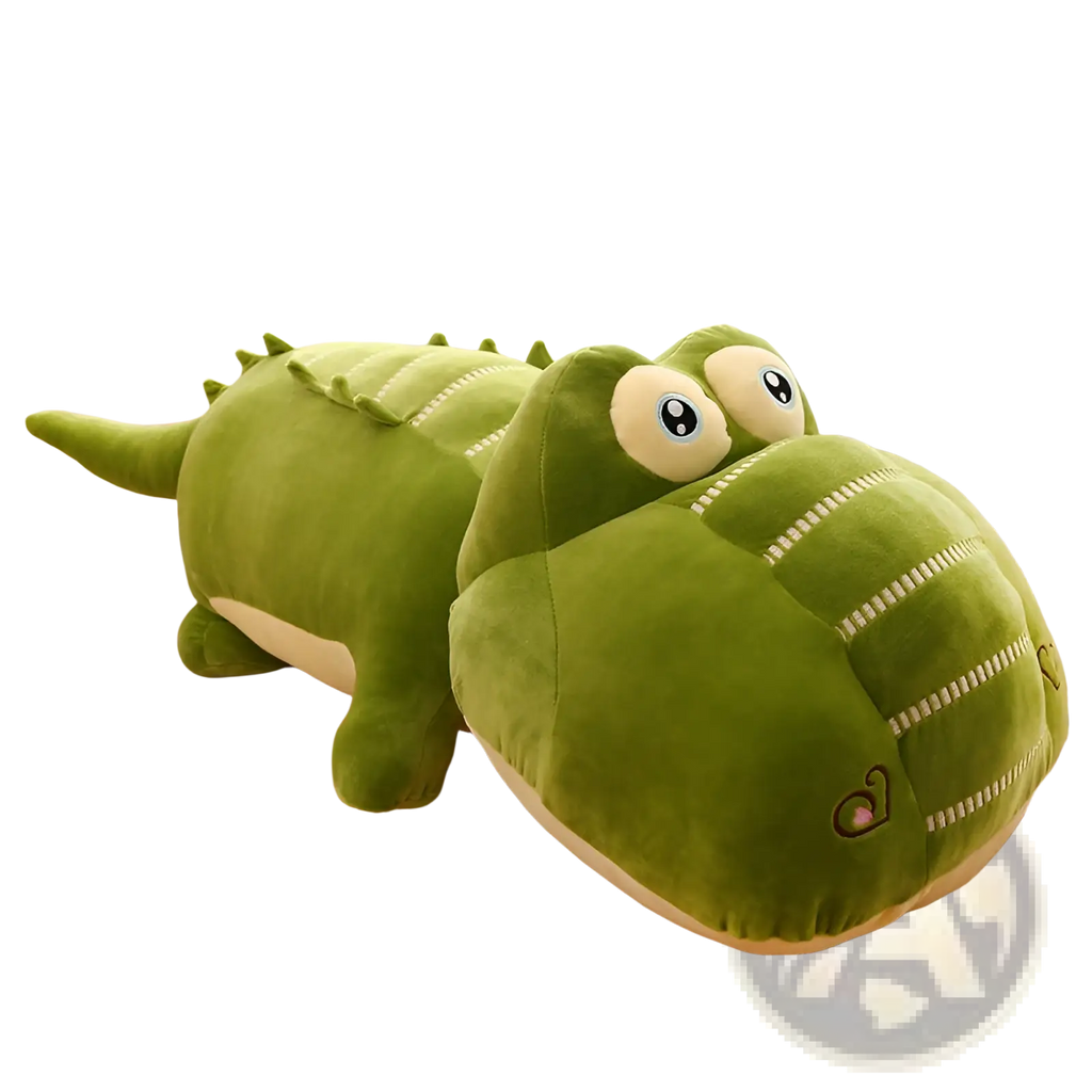 A plush green alligator soft crocodile sleep pillow with velour texture large yellow eyes and stitched smile