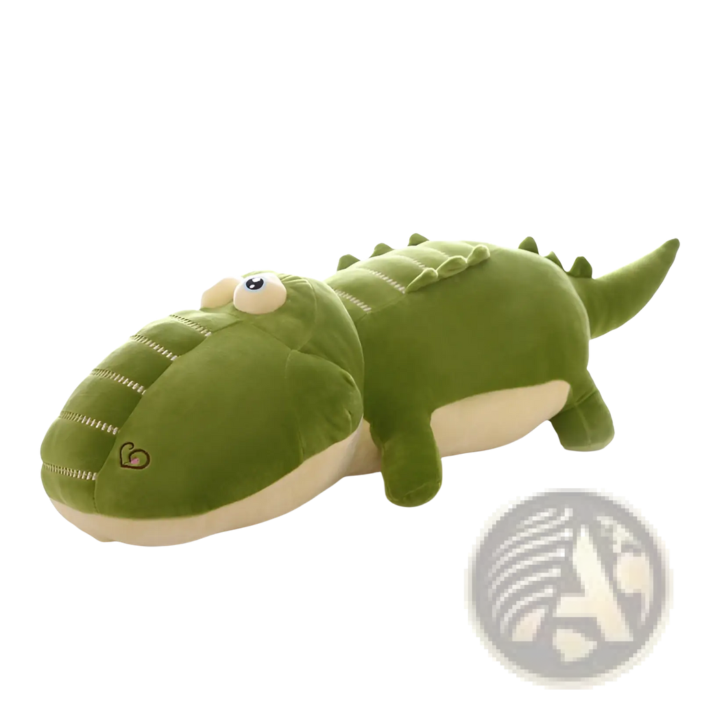A plush green alligator soft crocodile sleep pillow with a cream-colored underbelly and embroidered details