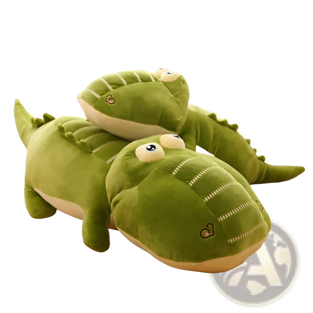 Soft green plush alligator toy with cream underbelly and embroidered hearts designed as a soft crocodile sleep pillow