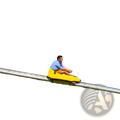 Yellow plastic sled on a metal slide from an alpine roller coaster outdoor amusement ride for recreational use