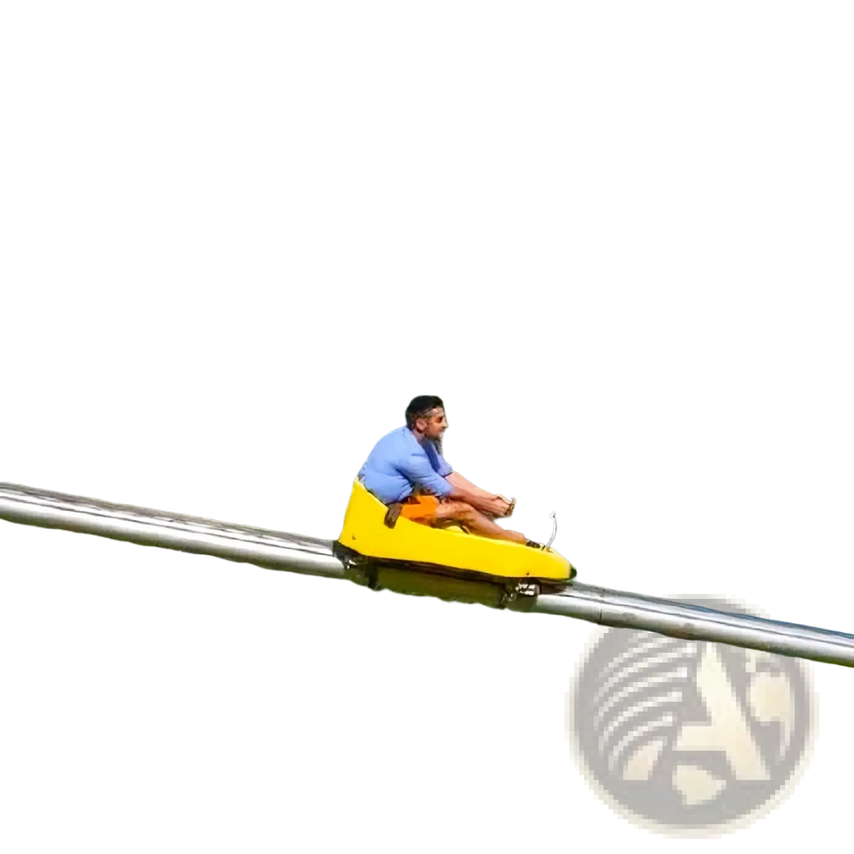 Yellow plastic sled on a metal slide from an alpine roller coaster outdoor amusement ride for recreational use