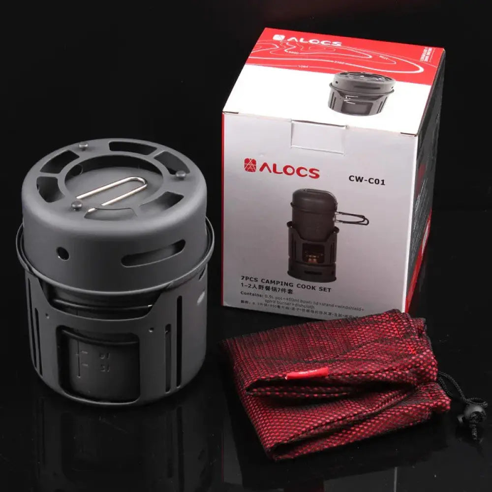 Gray aluminum portable camping stove model cw-c01 by alocs with circular top and side vents from a 7-piece cookware set