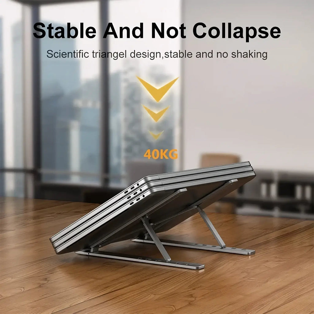 Silver metallic aluminum adjustable laptop stand with scientific triangle design foldable for ergonomic use