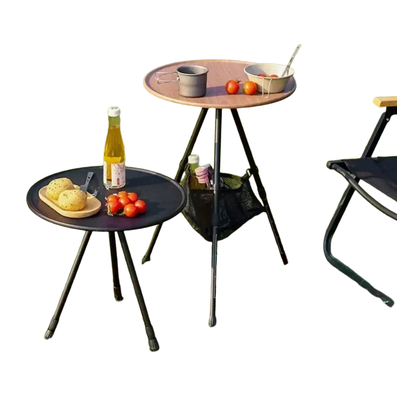 Black aluminum alloy folding camping table with round top tripod legs and mesh storage basket underneath