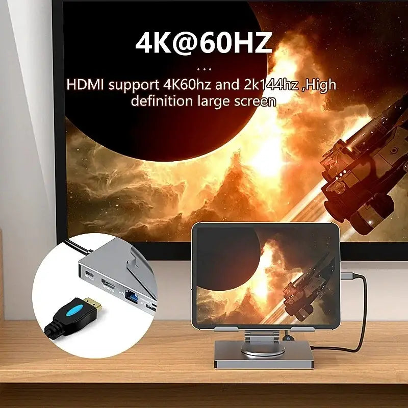 Silver metallic aluminum alloy docking station laptop with multiple ports and a blue accent on the connector