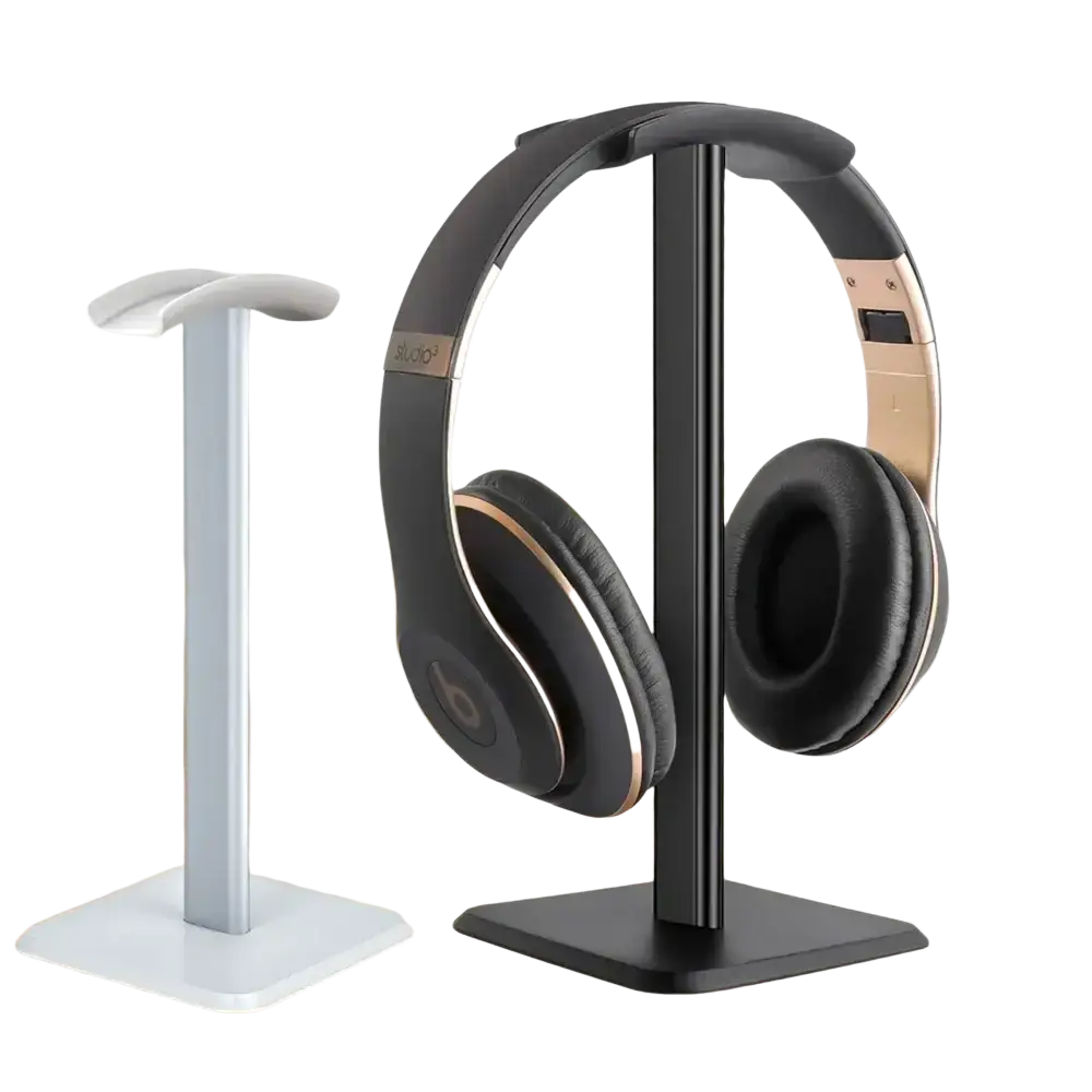 Black and gold beats studio headphones on an aluminum headphone stand with soft silicone top headset holder