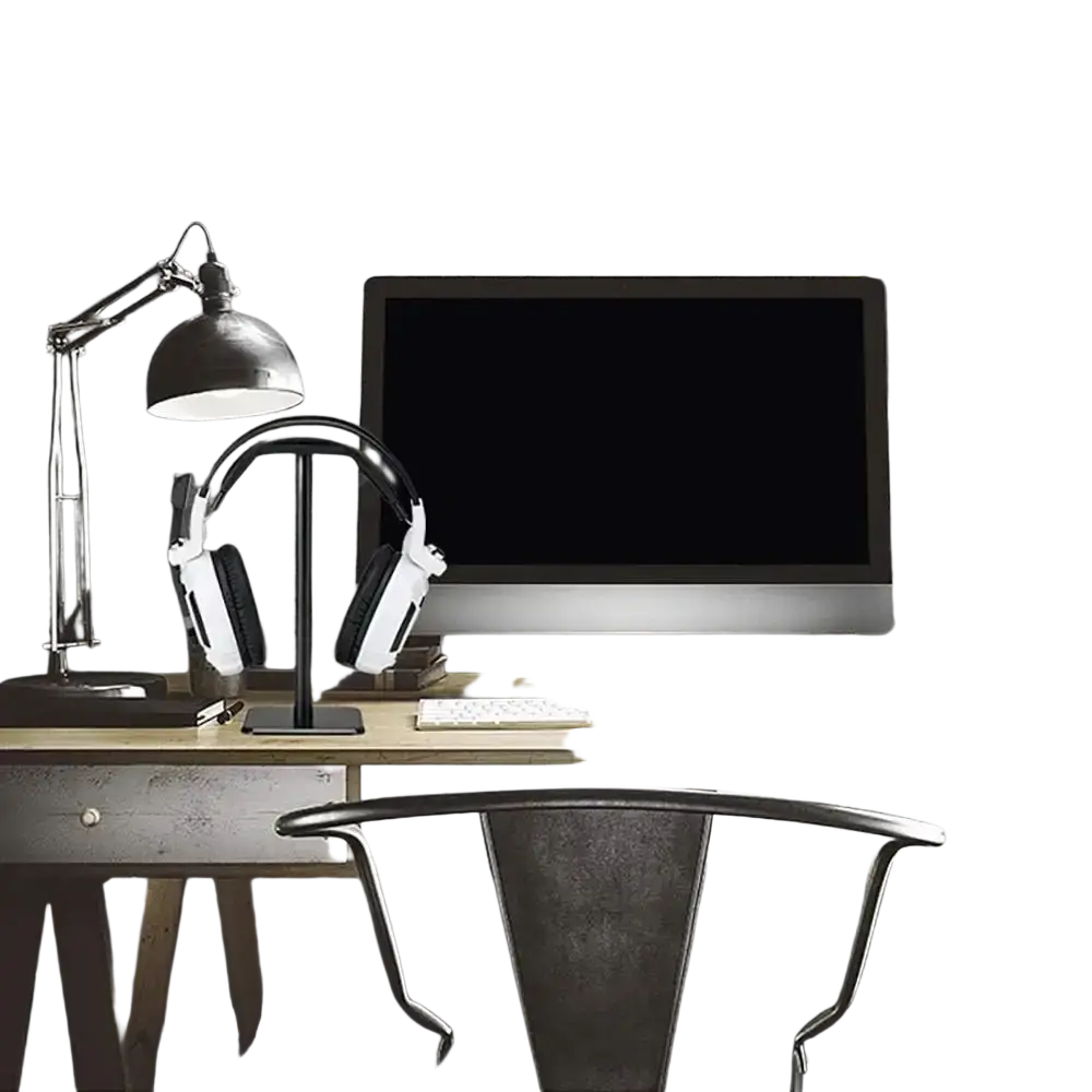 Black and silver desk lamp with adjustable arm and dome shade next to aluminum headphone stand with soft silicone top and metal rod