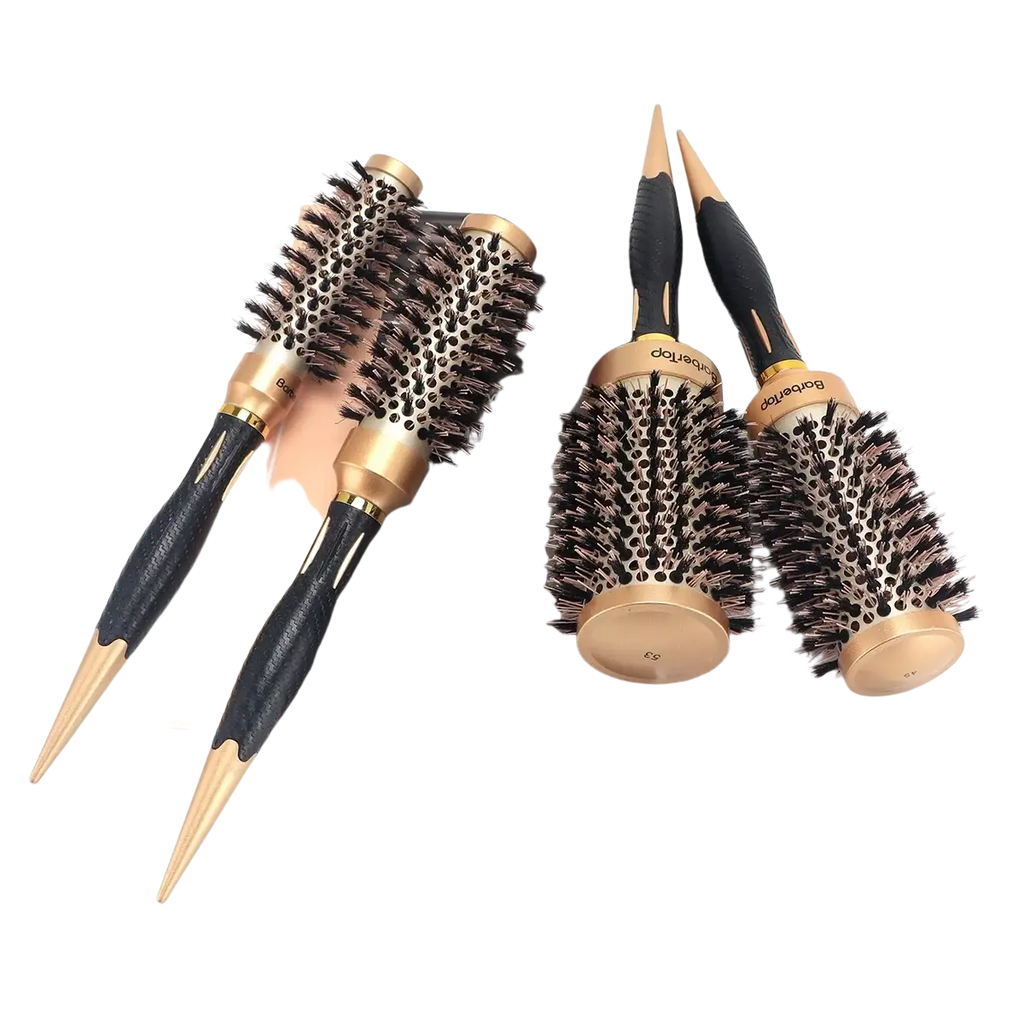 Set of four aluminum round hair styling brushes with gold accents black textured handles and dense dark bristles