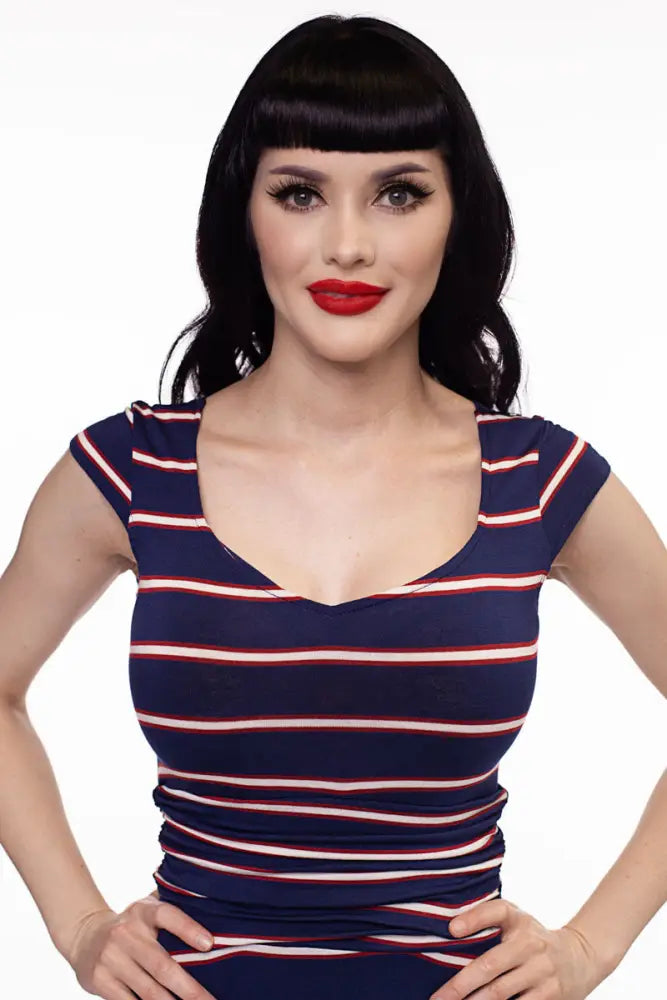 Amelia navy and pink striped 1950s style midi dress featuring a navy blue red and white sleeveless top with square neckline