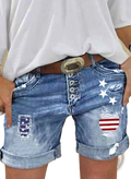 Blue denim american flag ripped shorts with distressed patches and rolled cuffs for casual summer wear