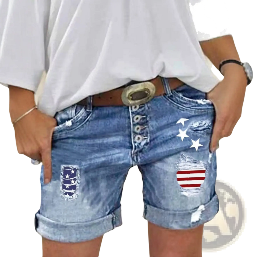 Blue denim shorts with distressed american flag patches and rolled cuffs in ripped american flag denim shorts design