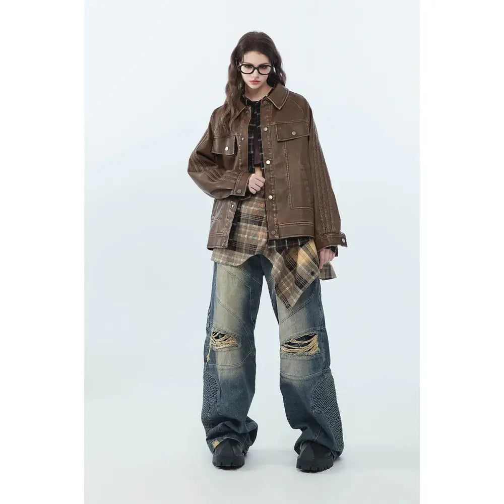 Brown distressed unisex pu leather biker jacket with flap pockets and button closures in denim style