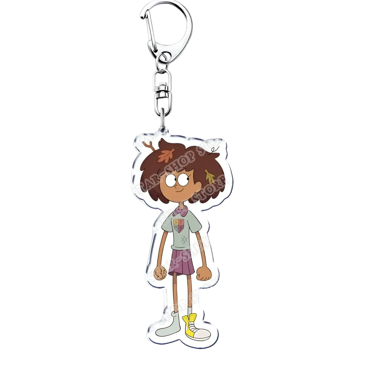 Clear acrylic Amphibia anime keychain featuring a cartoon character with brown hair in green shirt and purple skirt