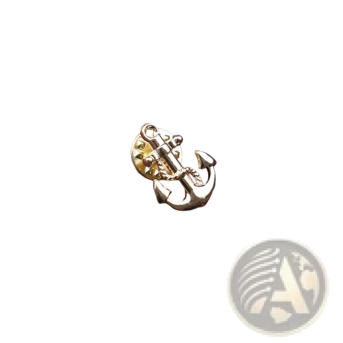 Gold-toned metal anchor lapel pin for men resting on textured maroon knitted fabric ideal for suits and brooches