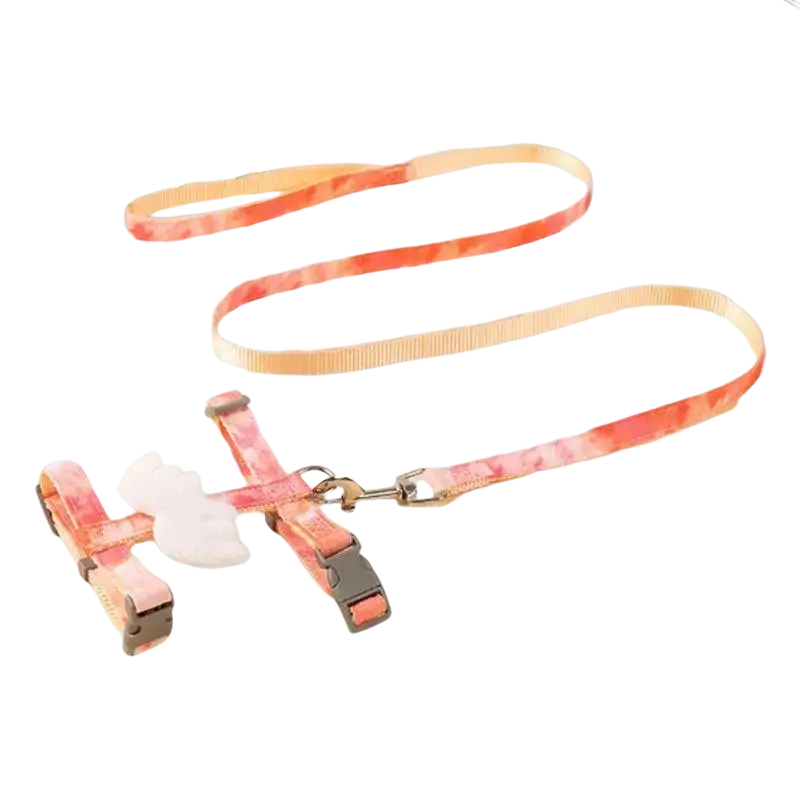 Angel wing cat harness and leash set in coral and peach tie-dye with adjustable buckles and white wing charm