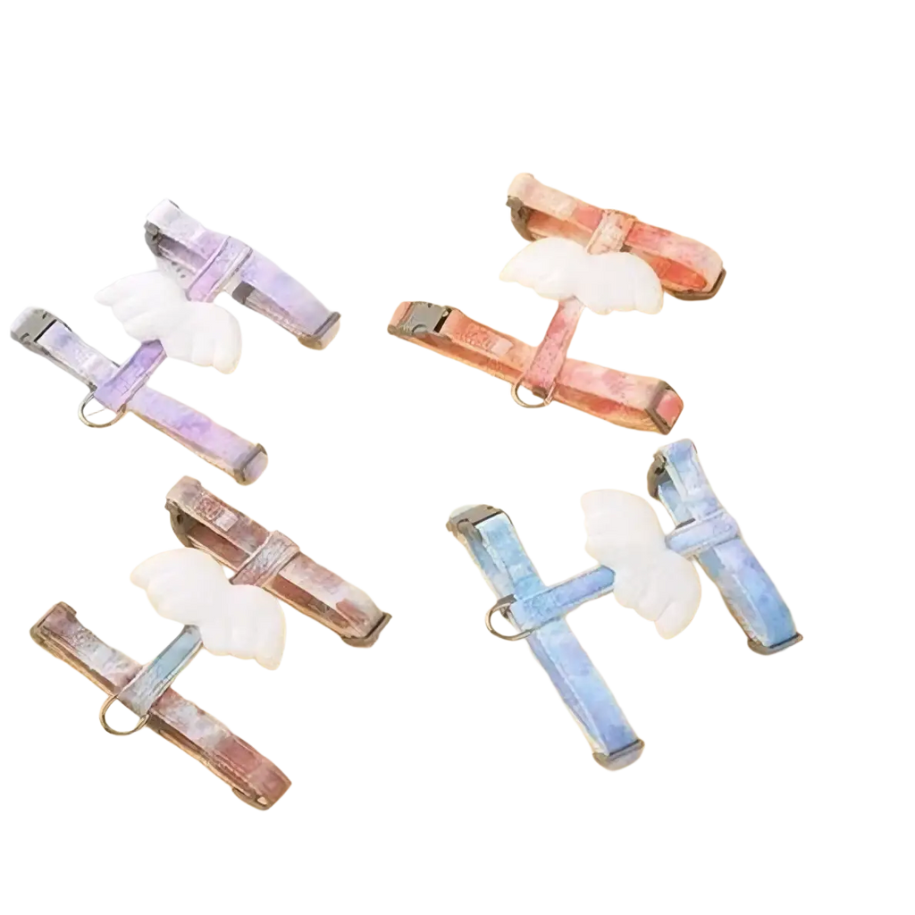 Pastel-colored cat harness and leash set with white angel wing charms designed for comfortable pet safety