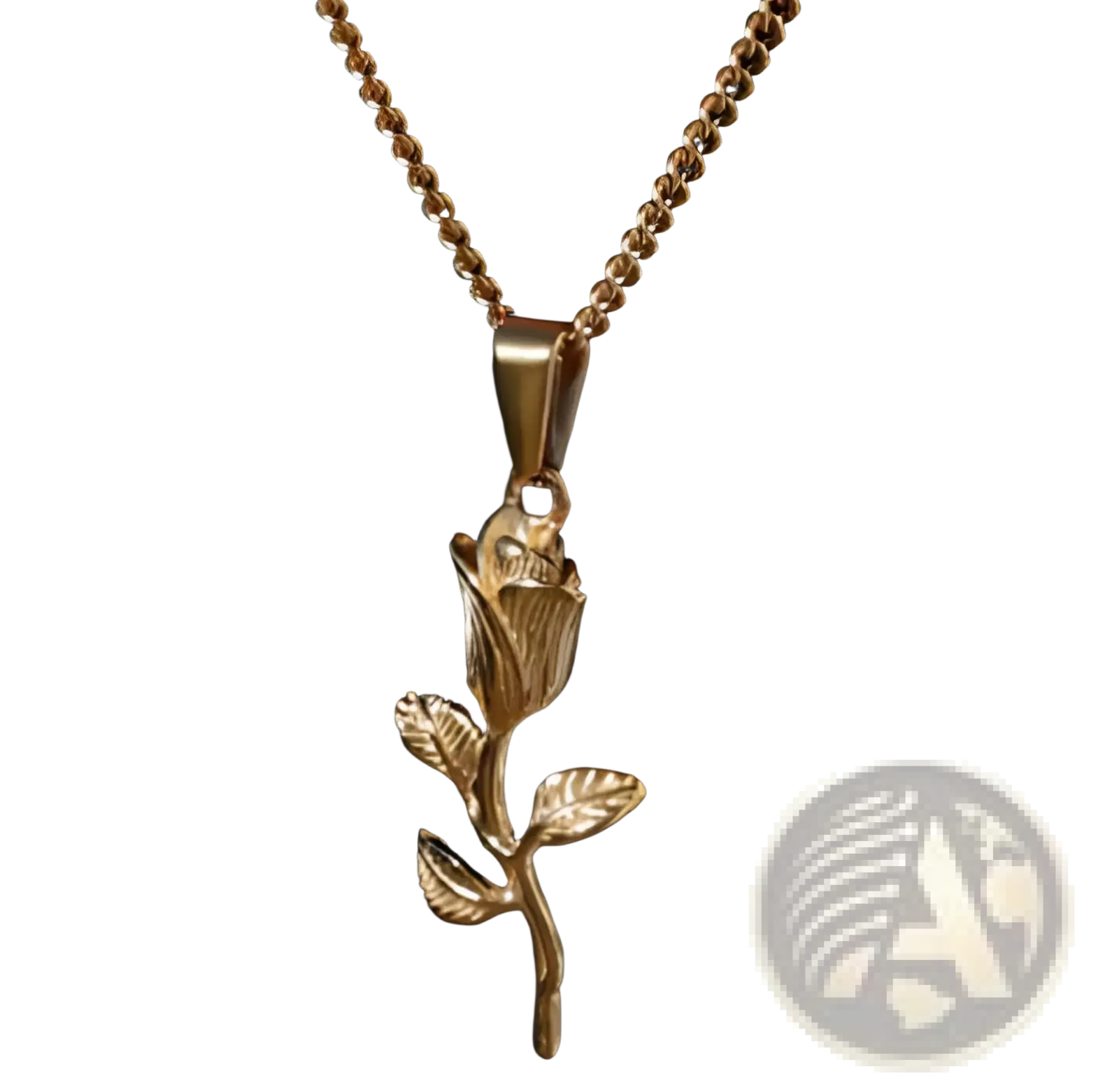 Gold-toned rose pendant necklace with detailed petals and leaves hanging from a matching rope chain in angel wing and compass style