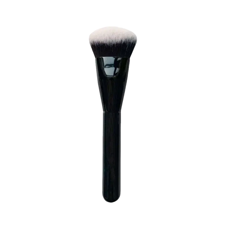 Angled foundation makeup brush with black synthetic handle and dense rounded head of soft white and black bristles