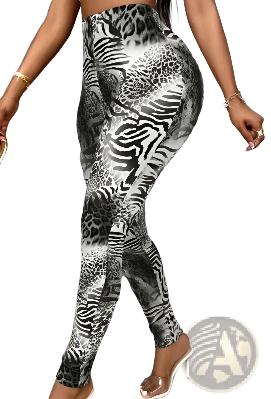 Black and white animal print stretchy high waisted leggings featuring bold zebra and leopard patterns