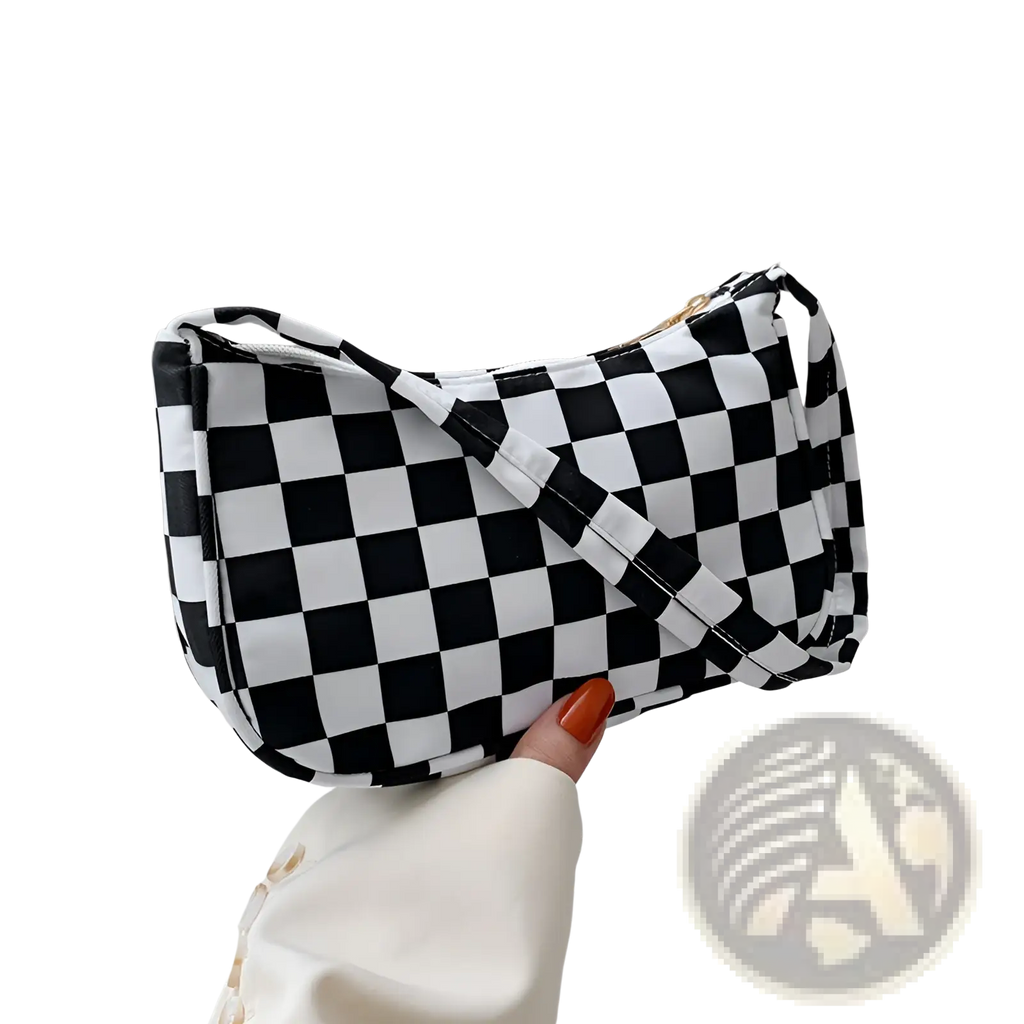 Black and white checkered underarm shoulder bag for women with sleek modern design and animal print details
