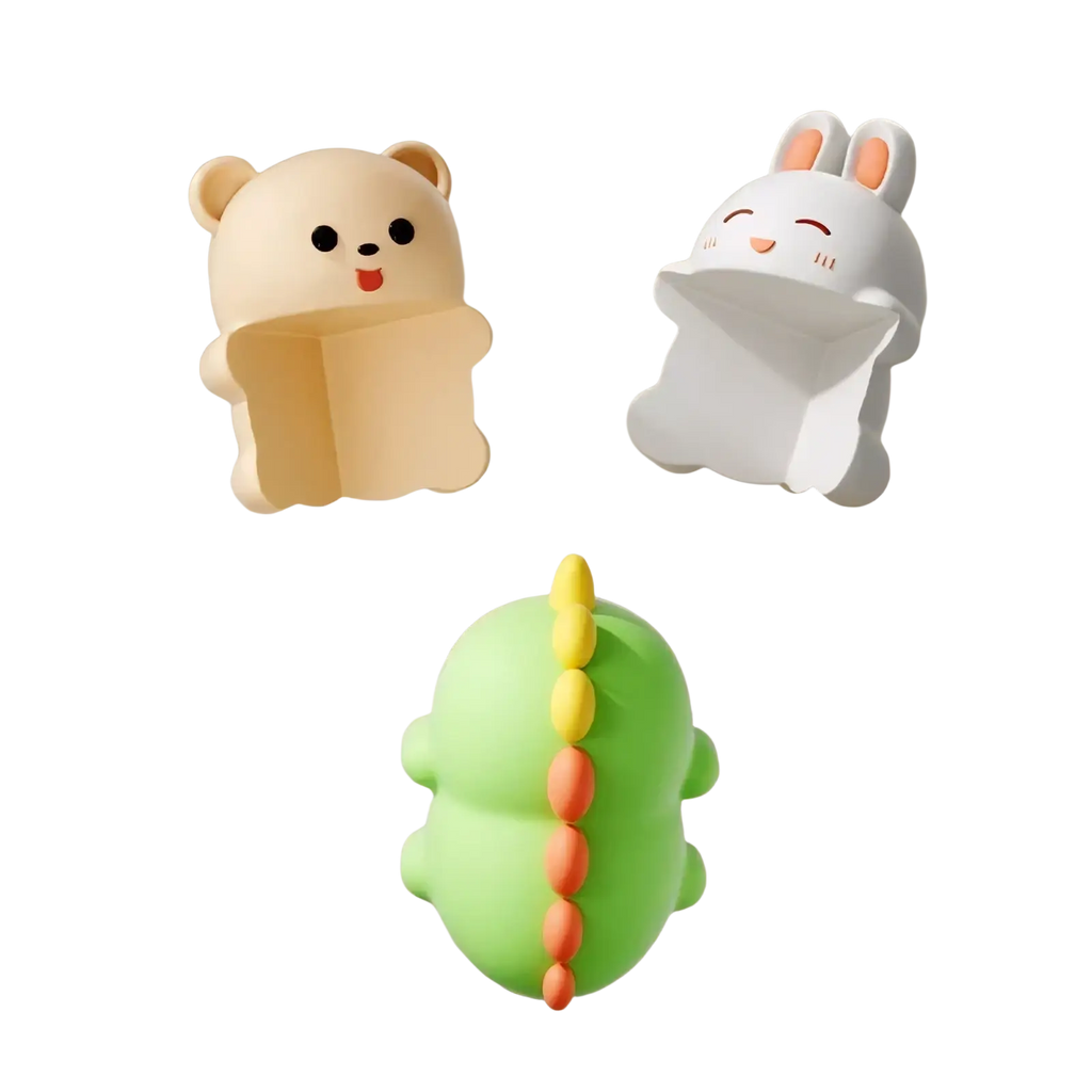 Pastel green dinosaur-shaped suction cup animal table corner protector with yellow and orange spikes for baby safety