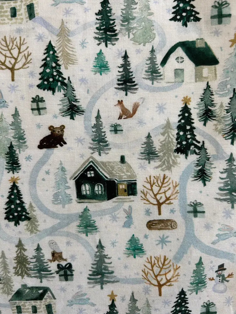Animal town Greta V-neck cotton holiday dress with cozy winter fabric featuring houses trees and woodland animals in soft colors