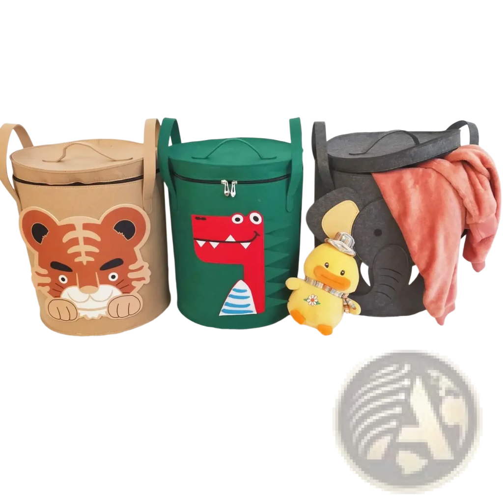 Three cylindrical fabric animal toy storage baskets with lids and handles in tan tiger, green dinosaur, and black elephant designs