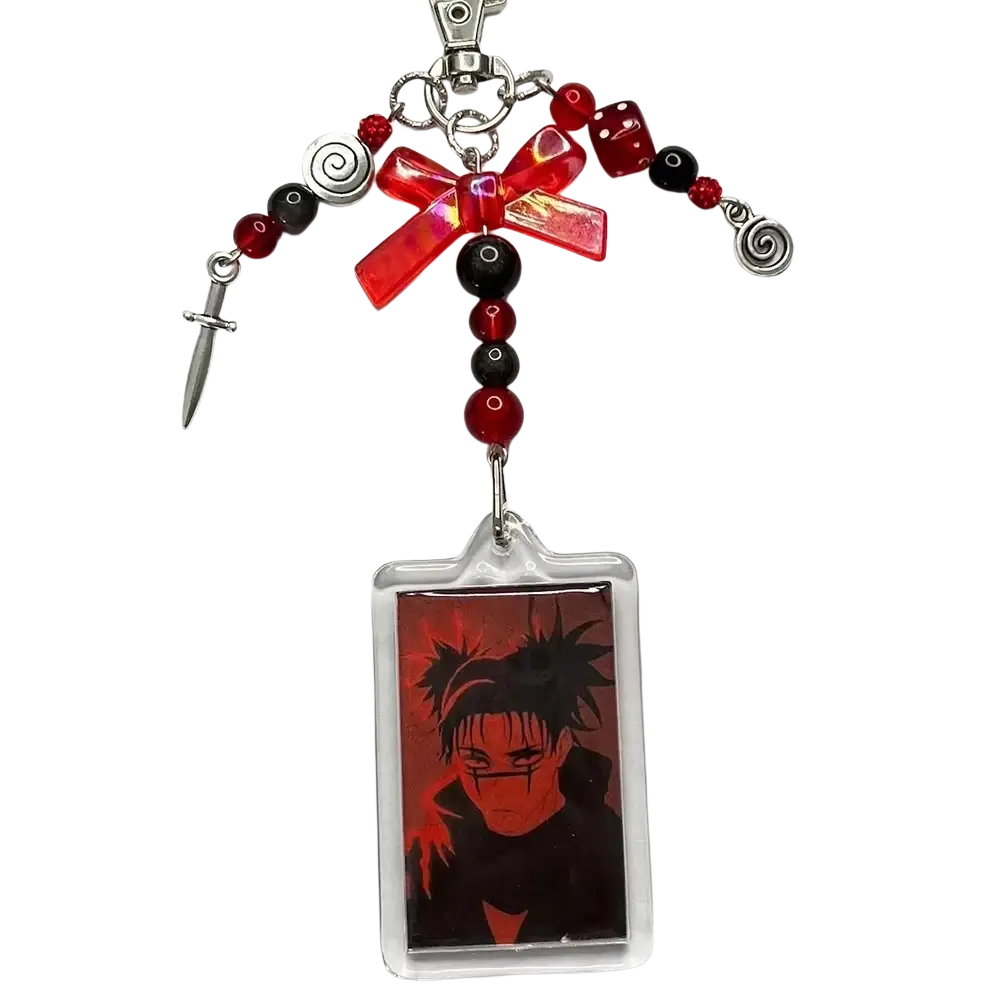 Red and black beaded anime beaded Y2k acrylic keychain with clear charm and silver dice, sword, and spiral charms