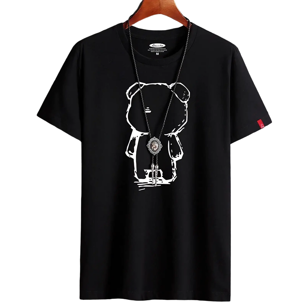 Black oversized cotton t-shirt featuring a white line-art cartoon bear graphic with one eye closed on wooden hanger