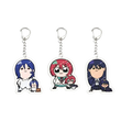 Three anime chibi acrylic keychains featuring vibrant hair colors and school uniforms for decorative use