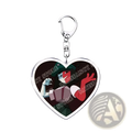Heart-shaped acrylic anime keychain with red and green cartoon character on dark background gamer gift