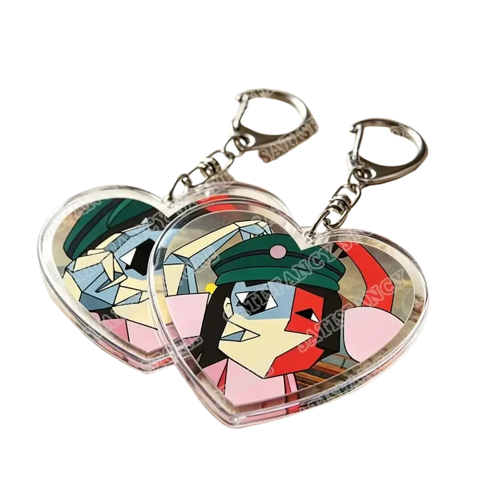 Clear heart-shaped acrylic anime keychains with colorful portraits and silver clasps ideal as gamer gifts