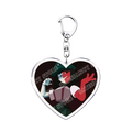 Heart-shaped acrylic anime keychain with red and green cartoon character on dark background gamer gift
