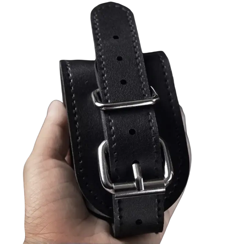 Black leather ankle strap with silver metal buckle and stitching for cable machine strength training