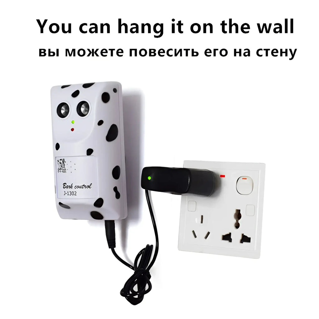 White dalmatian-patterned ultrasonic wall mount anti bark device with two circular sensors and indicator lights