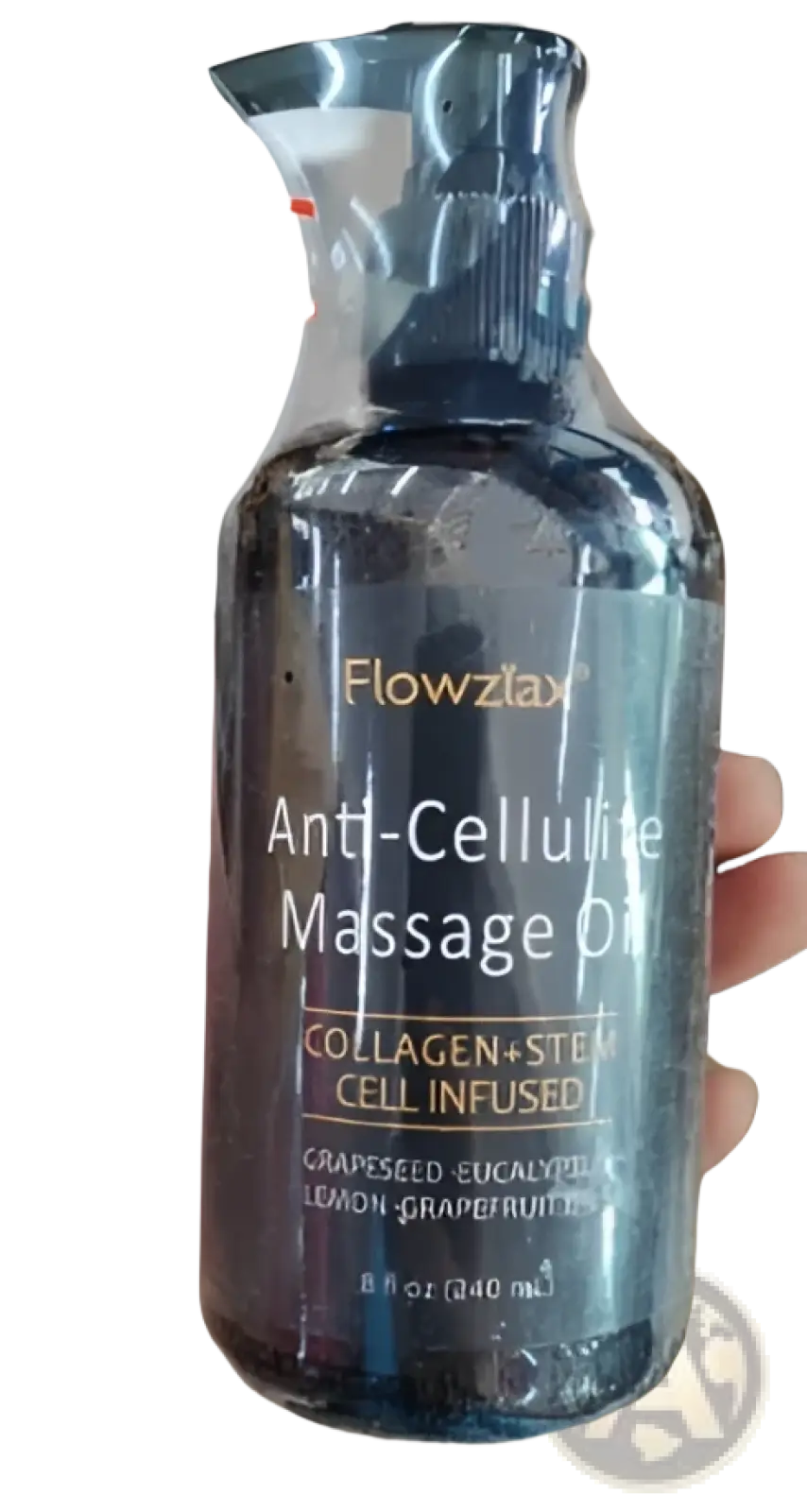 Dark amber glass bottle of Flowz lax anti-cellulite massage oil with black pump and collagen-infused label
