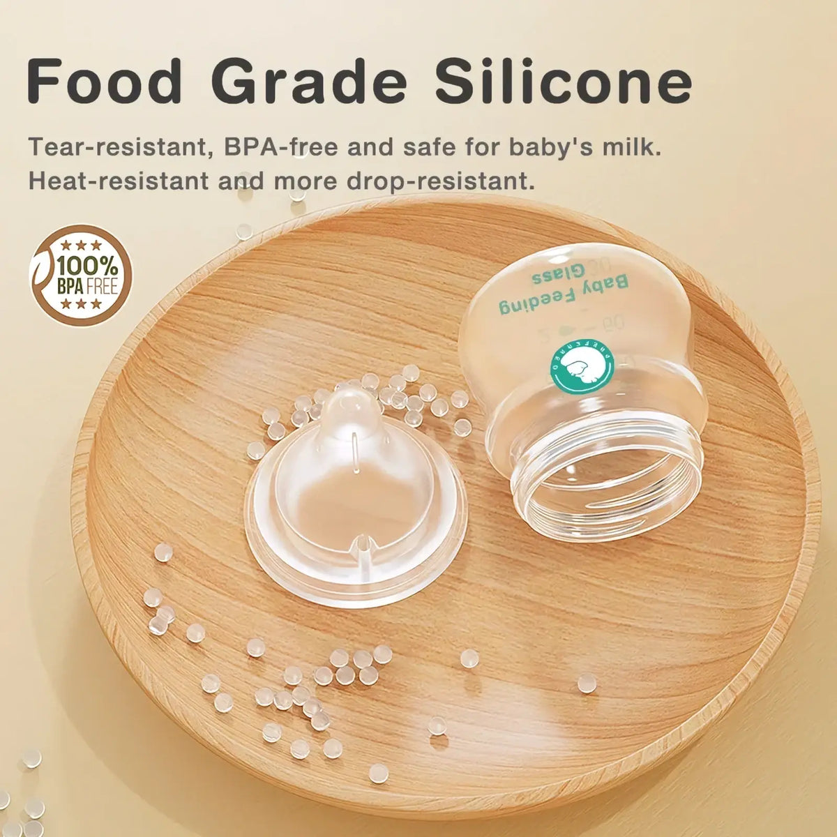 Clear silicone anti-flatulence glass baby bottle with transparent body and green labeling bpa free for feeding